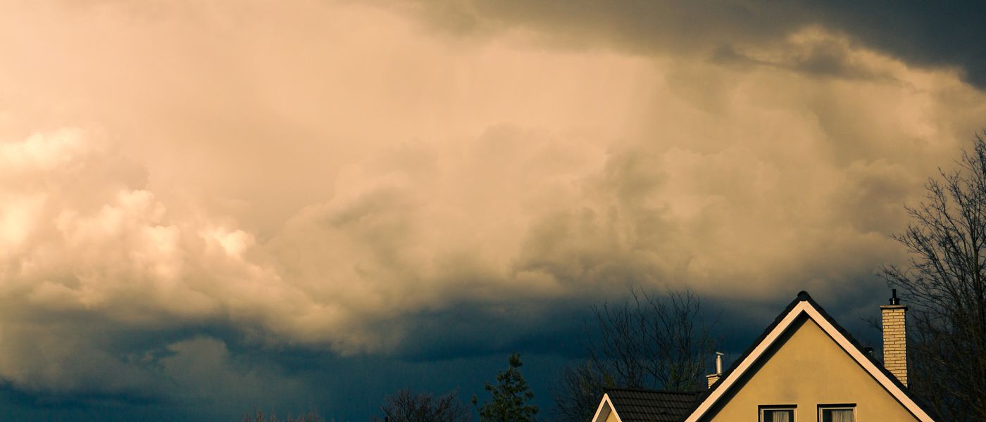 Storm clouds approaching over Houston neighborhood