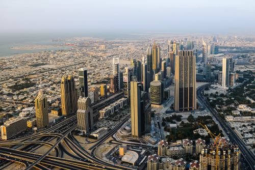 Free Breathtaking aerial view of modern skyscrapers in Dubai's bustling cityscape. Stock Photo