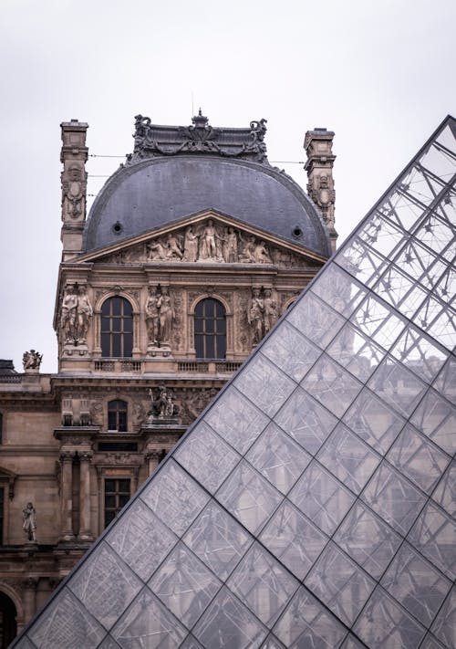 Close up of Louvre Pyramid and Building behind