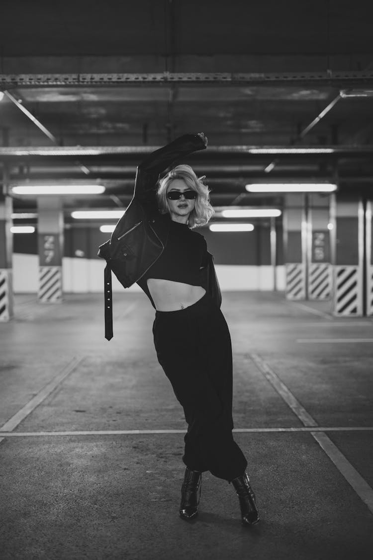 Woman Posing On Empty Car Park