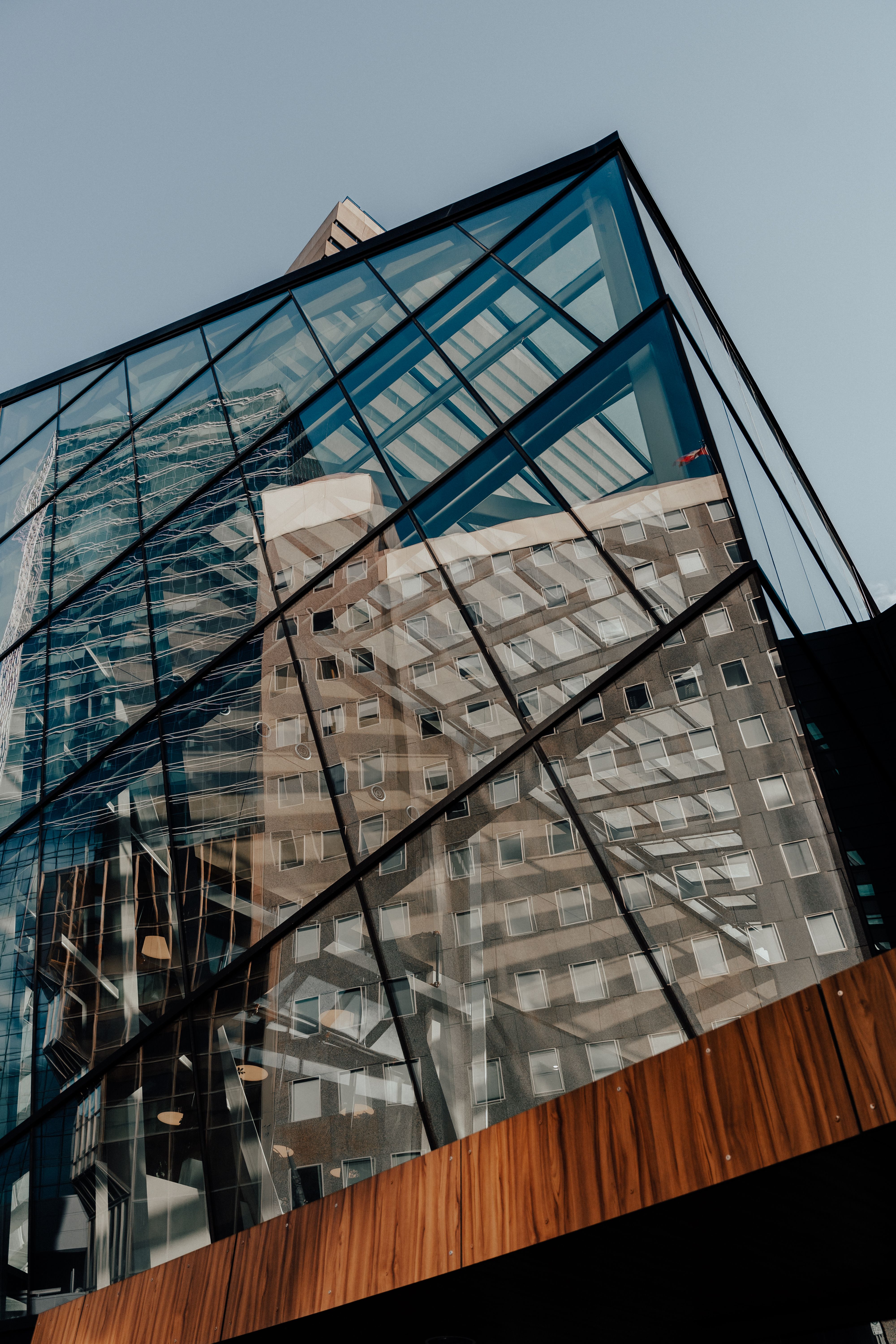 Low Angle Shot of Reflection of a Building in a Modern Glass Facade ...