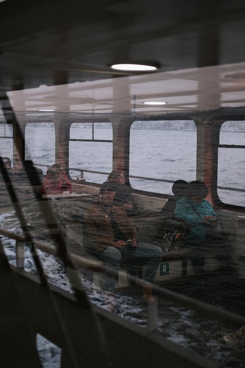 People Riding a Ferry
