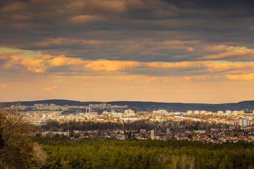 Scenic Cityscape with Cloudy Sky
