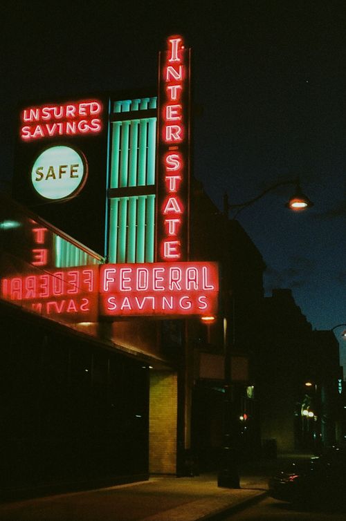 Free A neon-lit street scene at night in Kansas City, showcasing vintage signage. Stock Photo