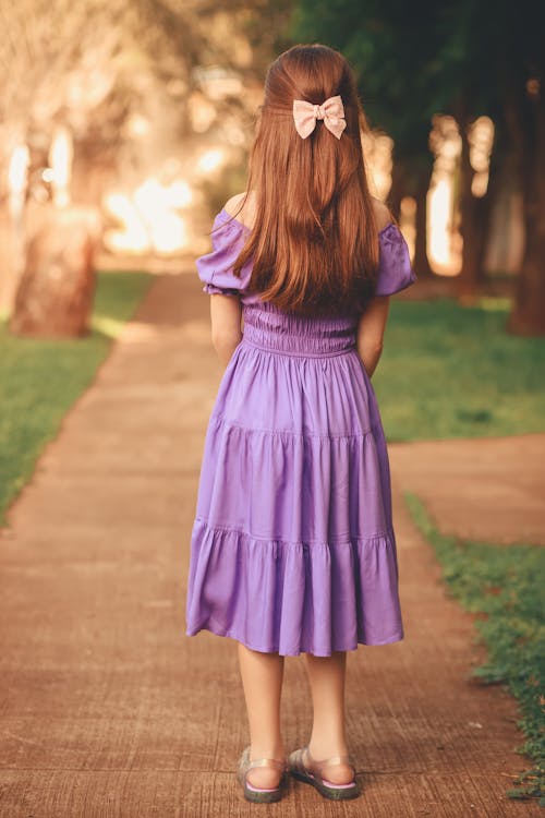 Elegant Girl in Purple Dress