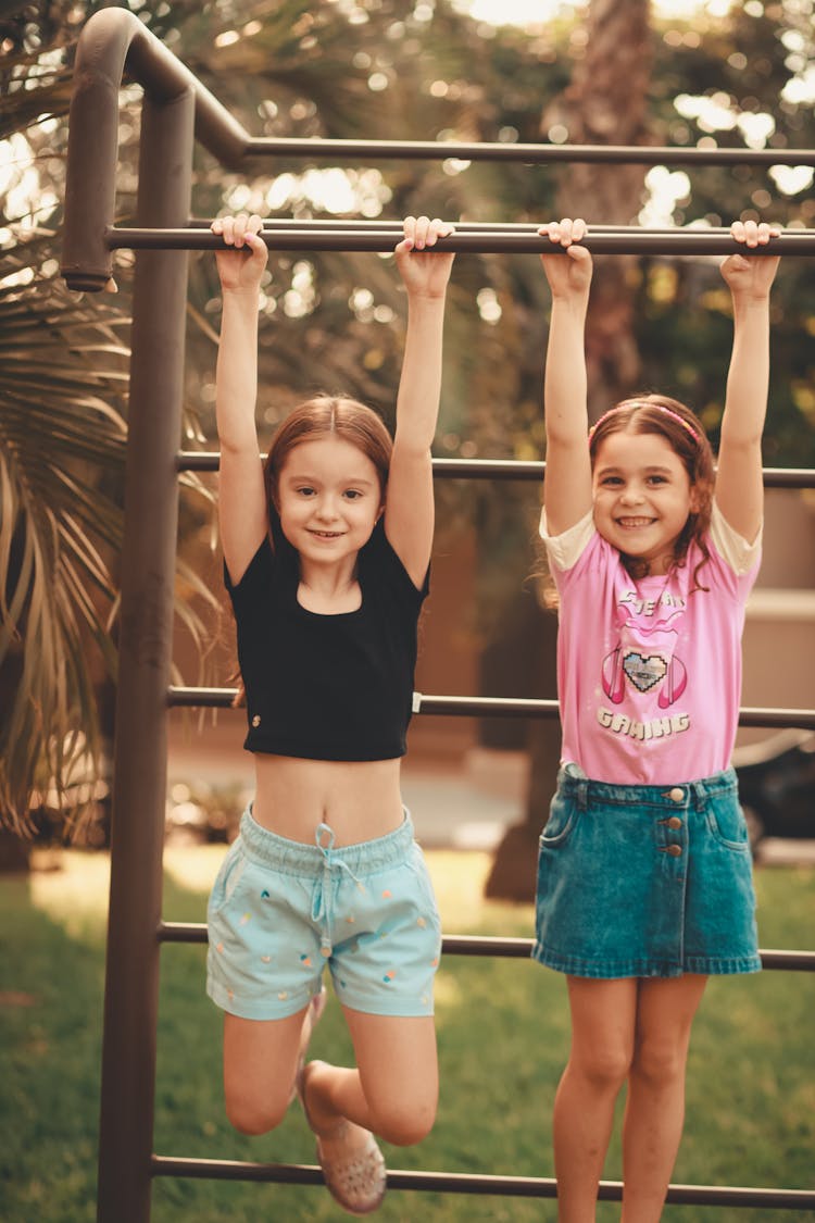 Girls Playing Together At Playground