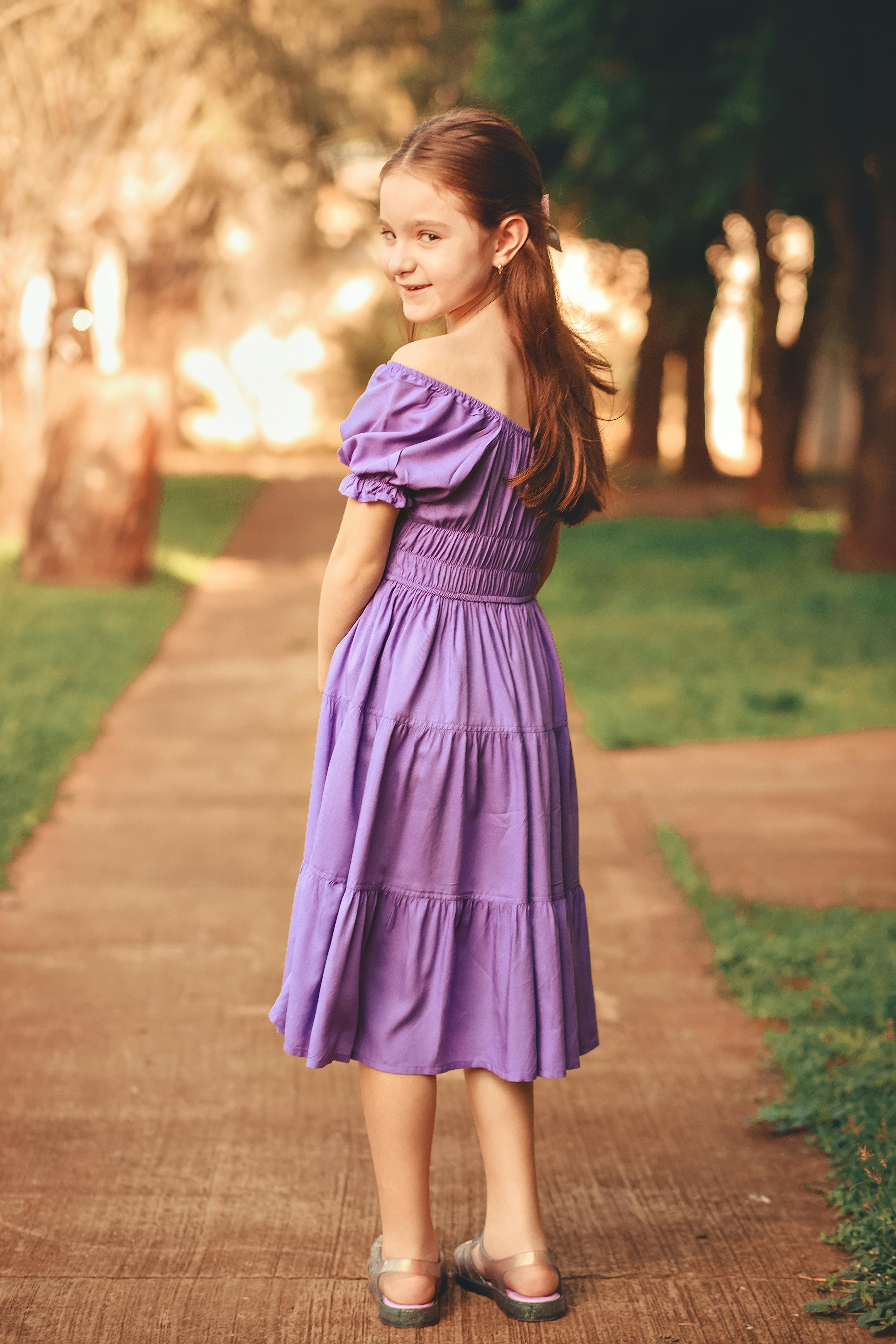 Premium Photo  Little girl in an elegant dress.the concept of a