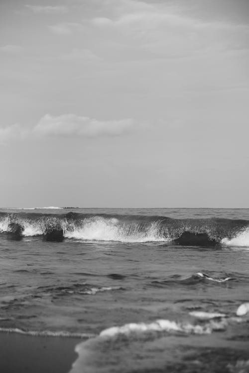 Black and White Photo of a Wavy Sea 