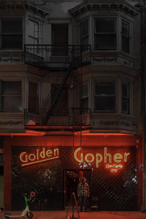 Facade of the Golden Gopher Bar Building with Illuminated Signs, Downtown Los Angeles, California, USA