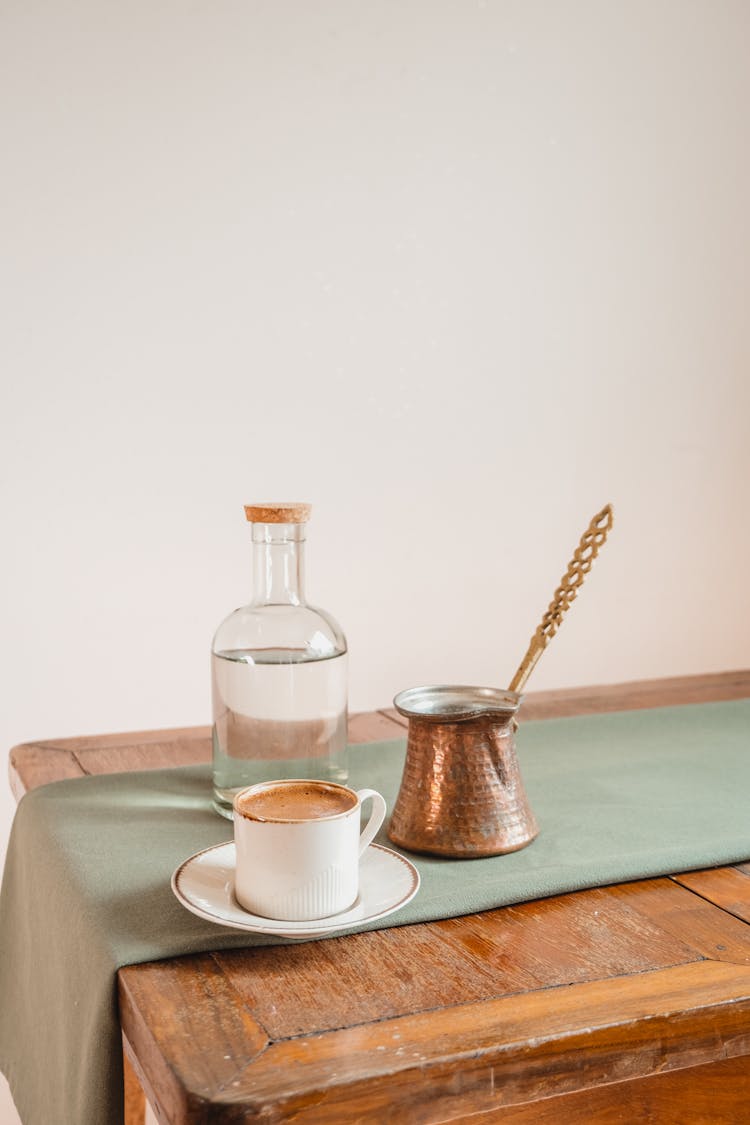 Cup Of Coffee On Wooden Table