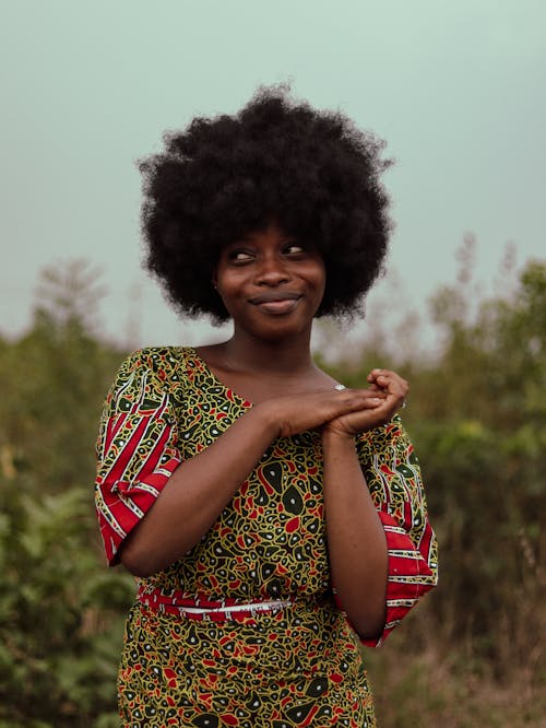 Smiling Woman with Afro Hairstyle