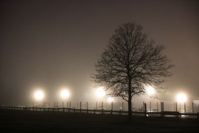 Fog rolling over a harbor at night, photo by David Kanigan on Pexels