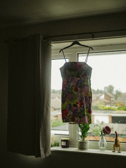 Dress Hanging and Drying on Windows