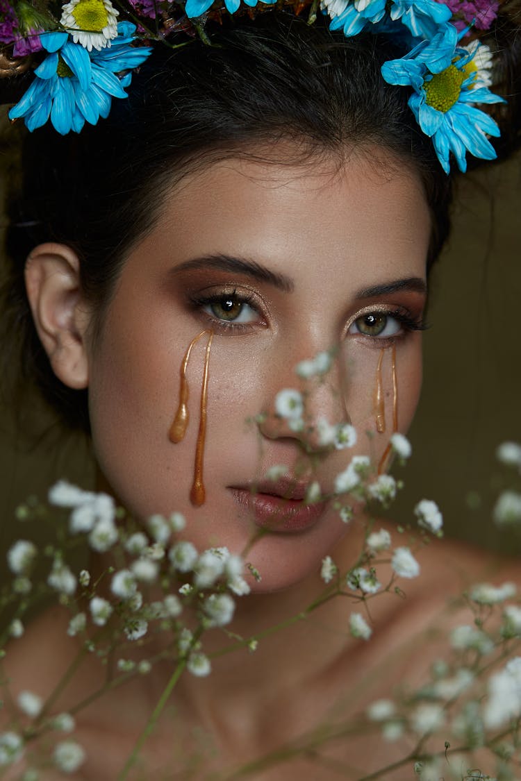 Flowers And Cream On Woman Face