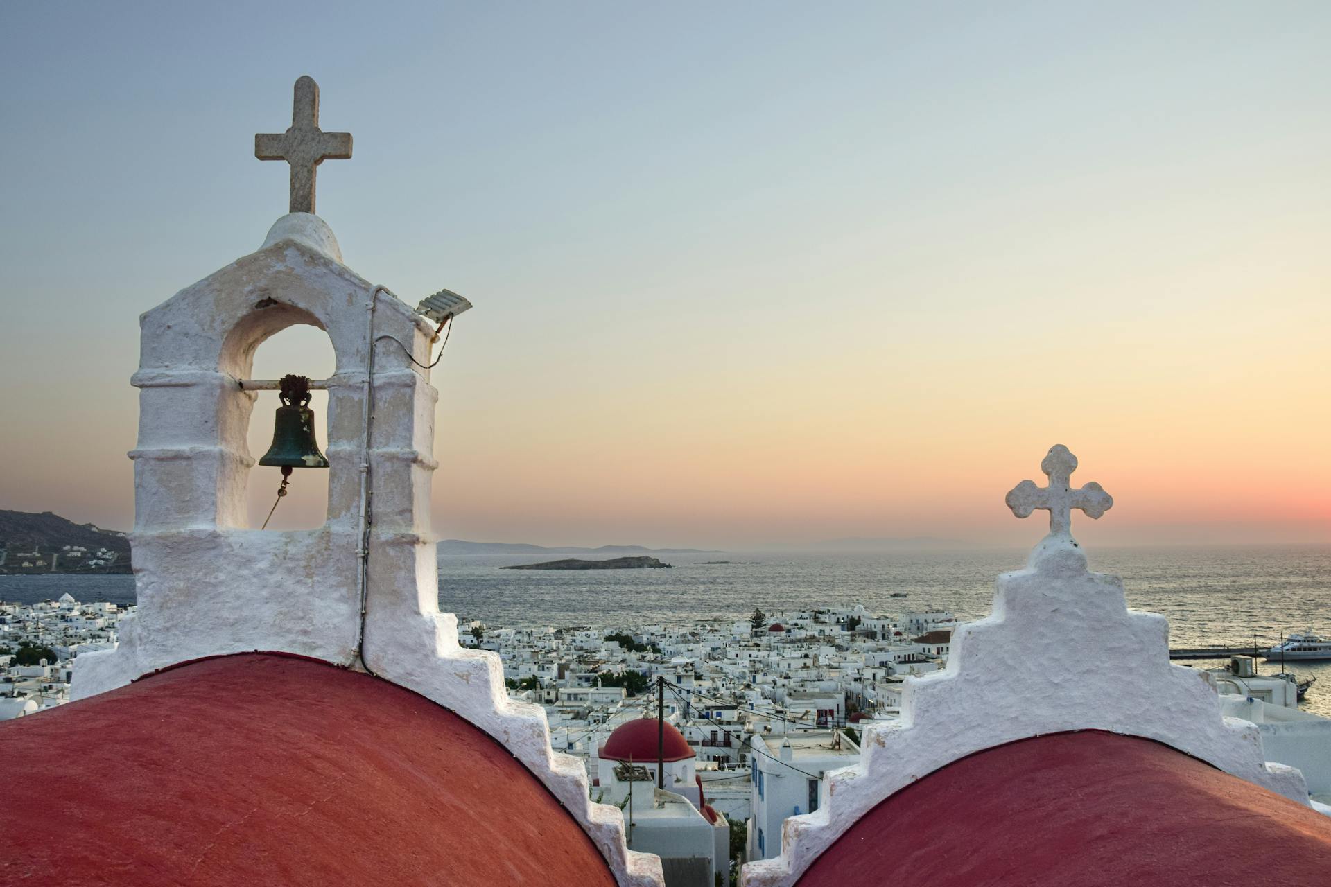 Towers of Church on Mykonos in Greece at Sunrise