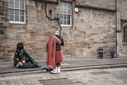 Foto profissional grátis de bagpipers, calçada, calçadas