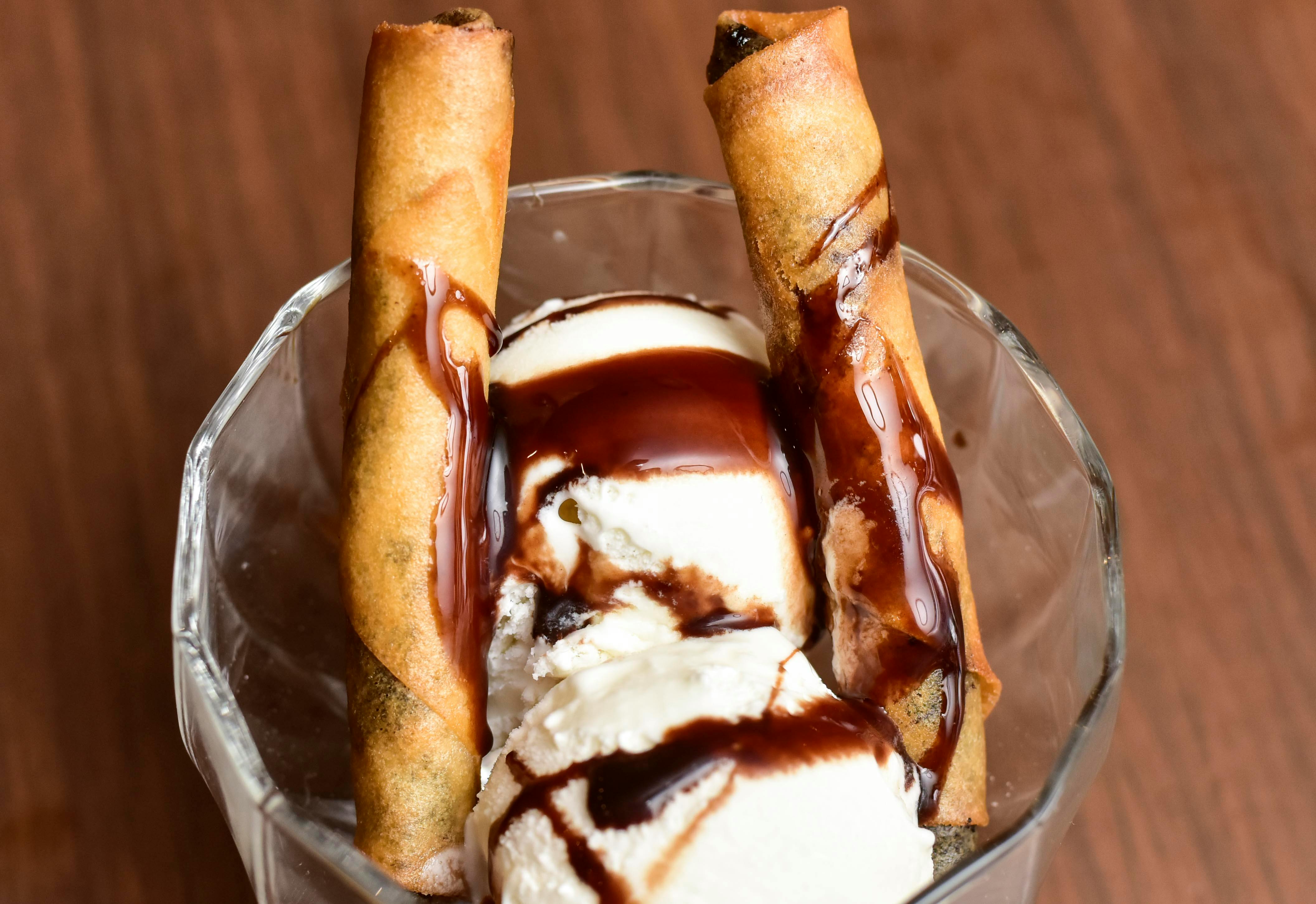 Aerial view of a city under heavy storm clouds, symbolizing climate risk