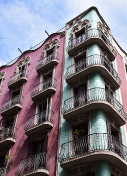 Art Nouveau architecture of a vibrant building corner in Barcelona, Spain.