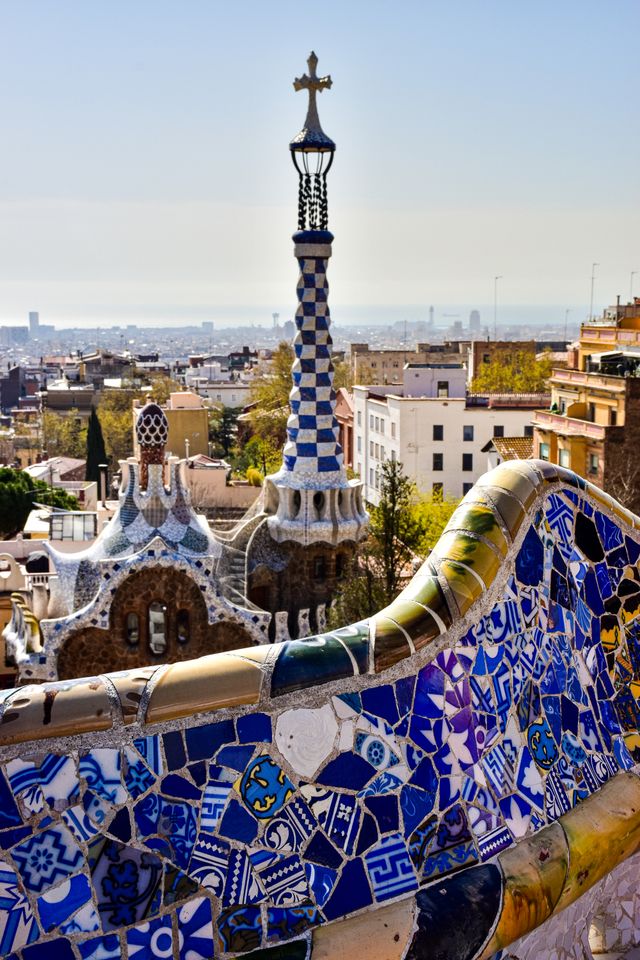 Colorful trencadis mosaics crowning the Park Guell terrace