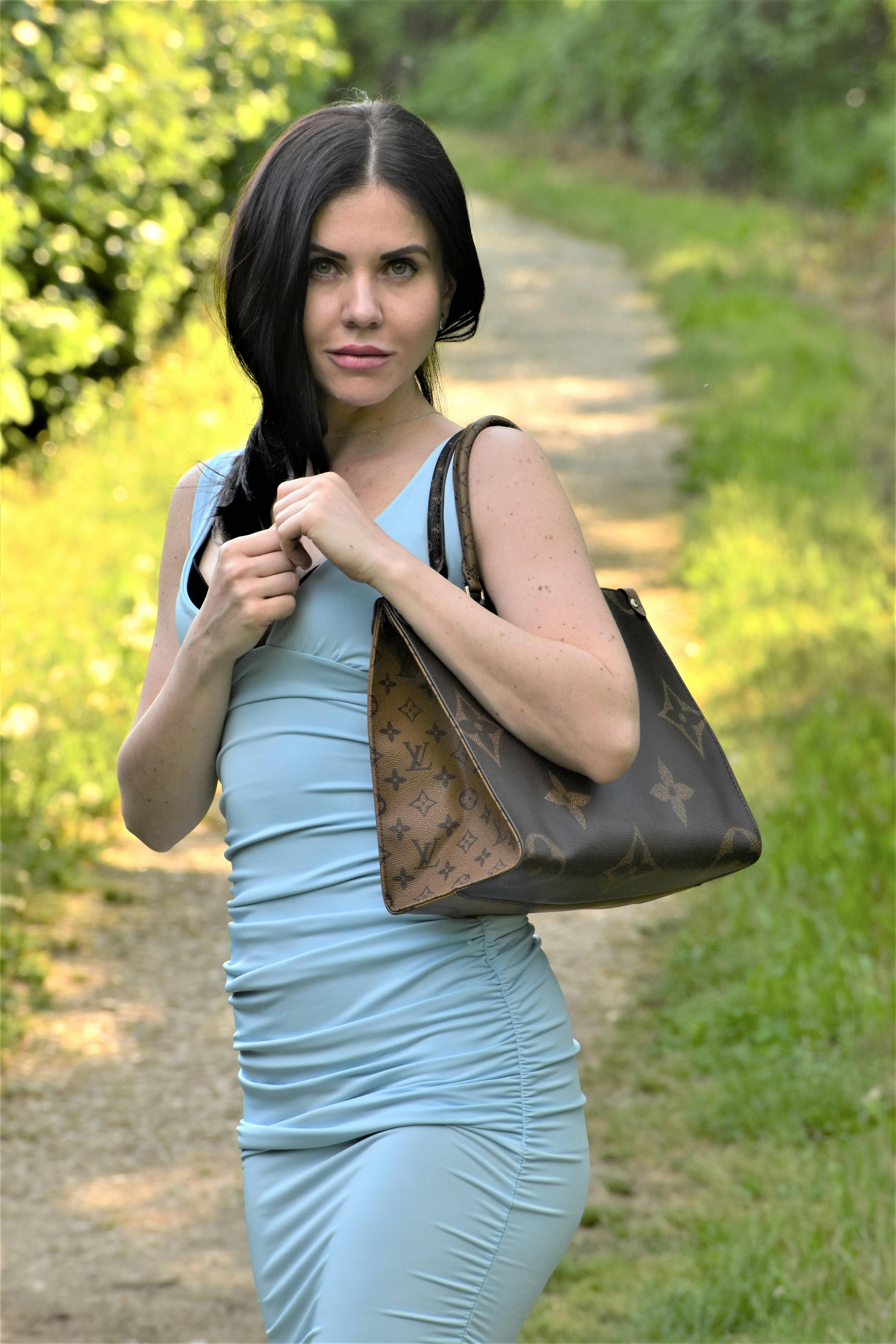 Women With a Louis Vuitton Handbag! · Free Stock Photo