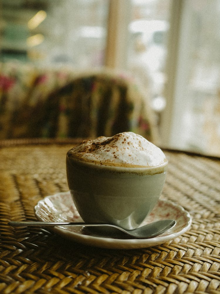 Coffee Cup On Plate With Spoon