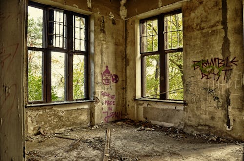 Brown Concrete Room With Windows during Daytime