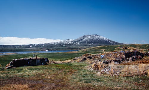 Sheds in Village with Mountain behind