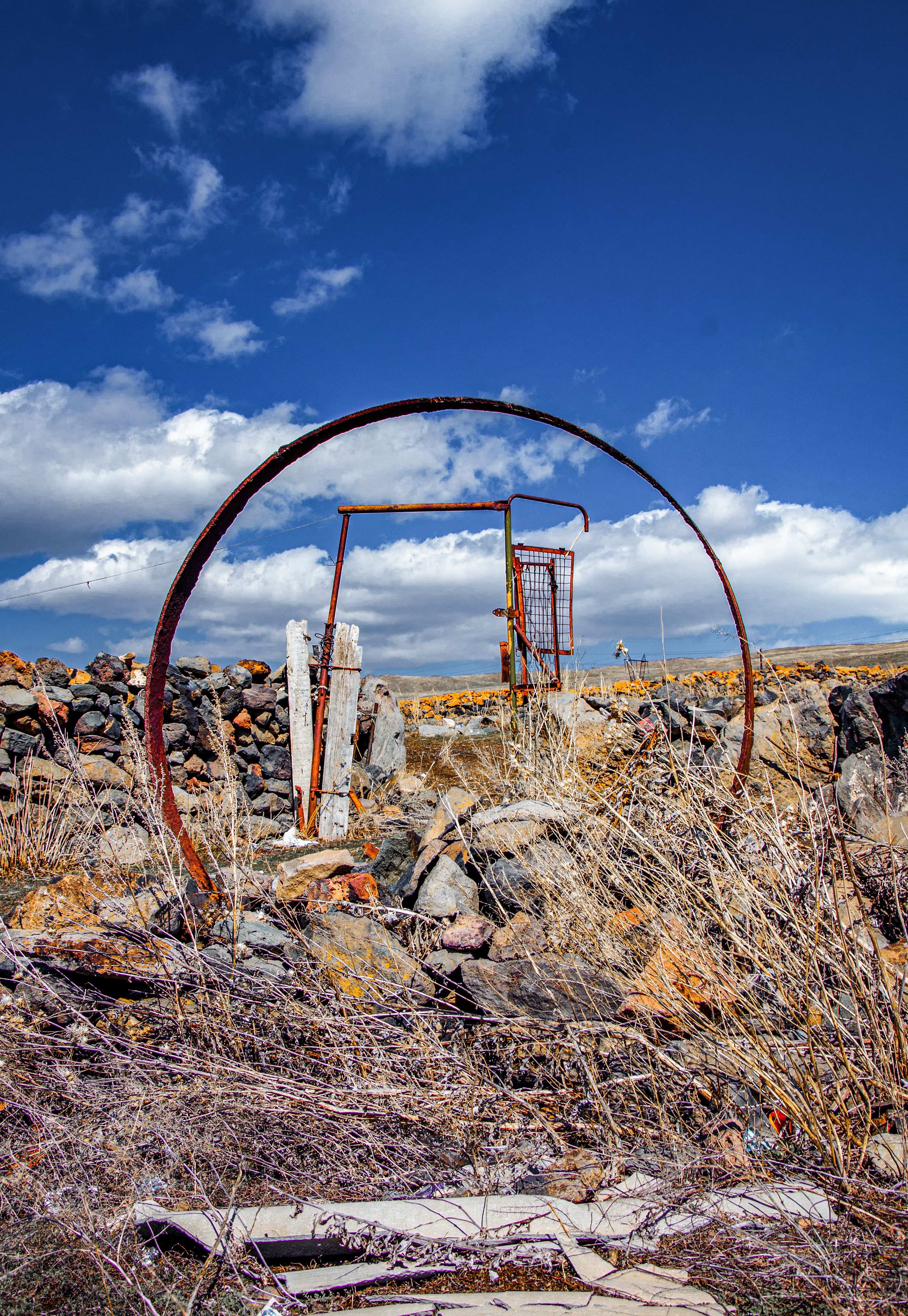 Rusty Constructions on a Field · Free Stock Photo