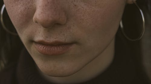 Close-up of the Lower Part of the Face of a Young Woman 