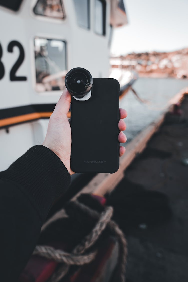 Cellphone With Fisheye Lens In Hand