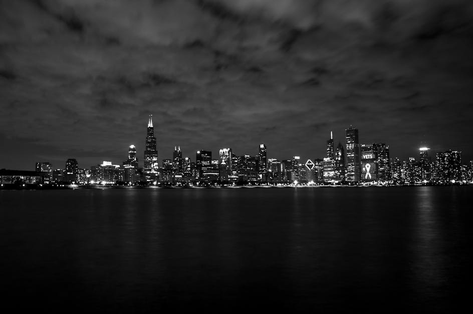 Gray Scale of City Skyline Photography · Free Stock Photo