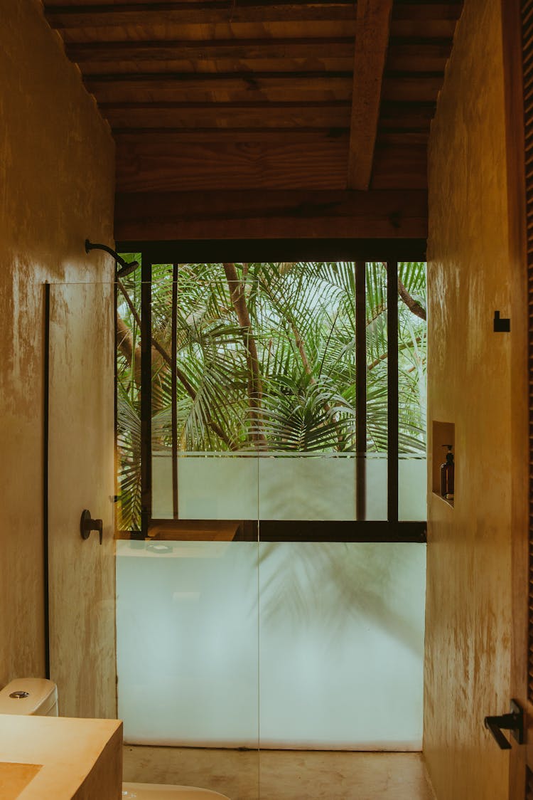 Shower In Wooden House In Tropical Landscape