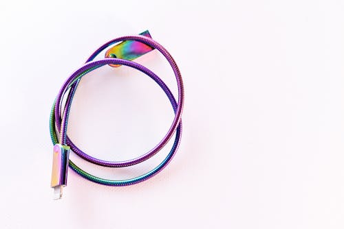 Free Iridescent Cable Wire On White Surface Stock Photo