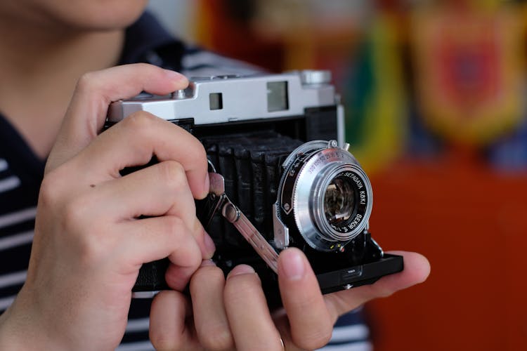 Hand Holding Vintage Camera