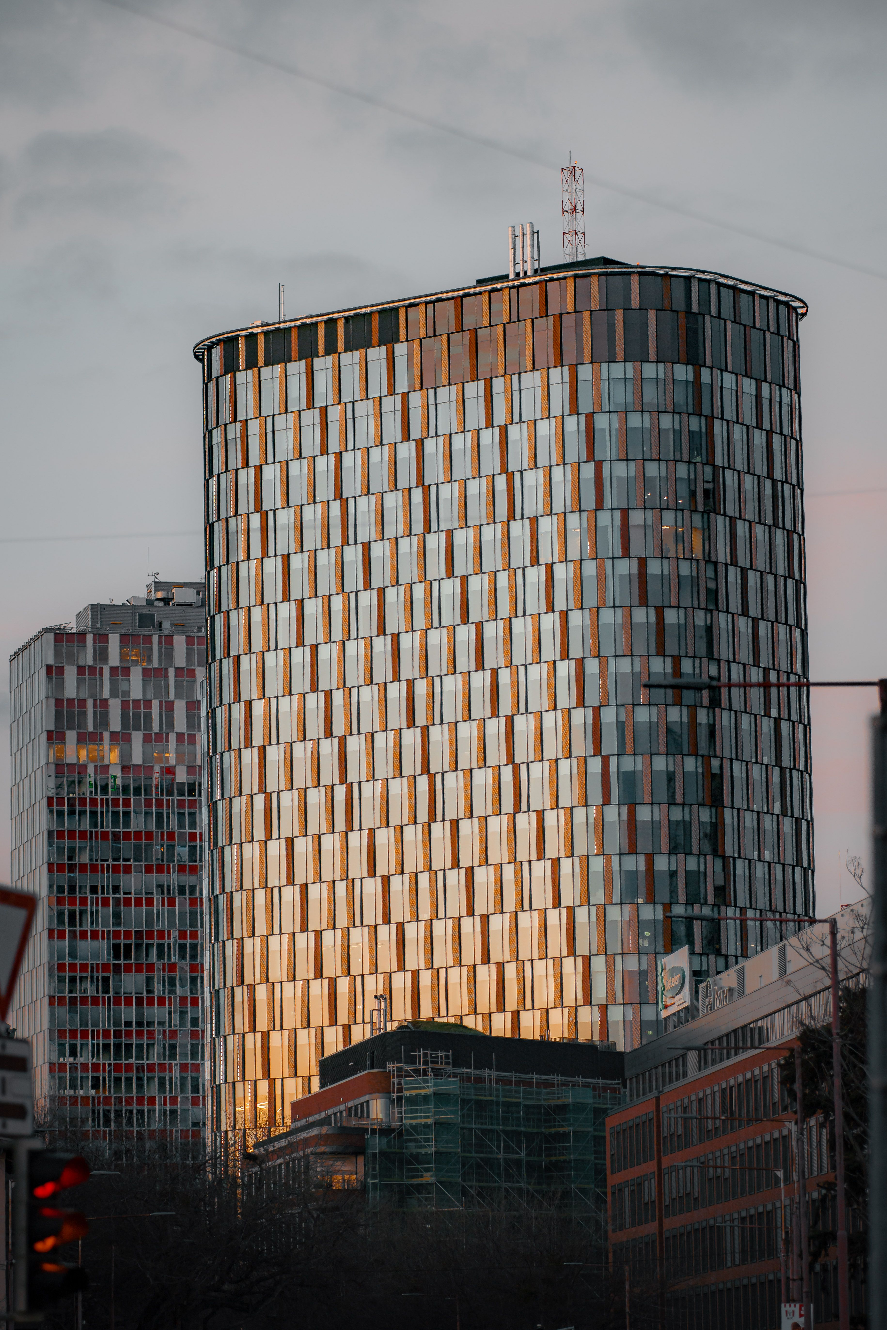 Sunset Reflecting in a Modern Glass Skyscraper · Free Stock Photo