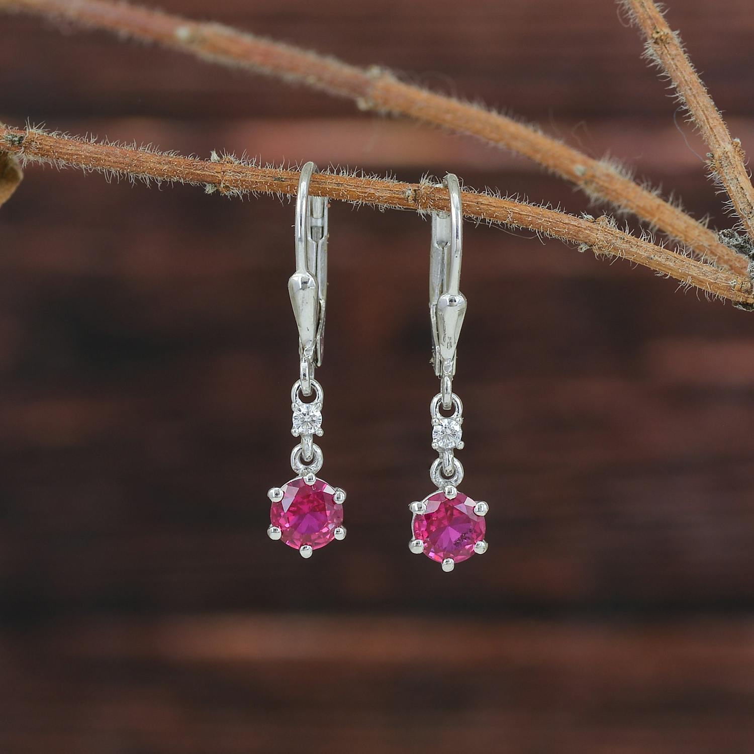 Close-up of Silver Earrings with Pink Gem Stones · Free Stock Photo