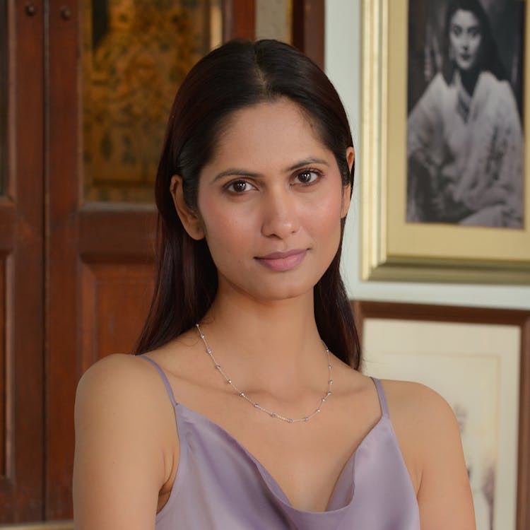 Young Brunette Wearing A Silver Necklace 