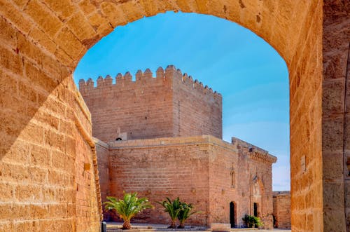 Ancient Stone Castle against Blue Sky