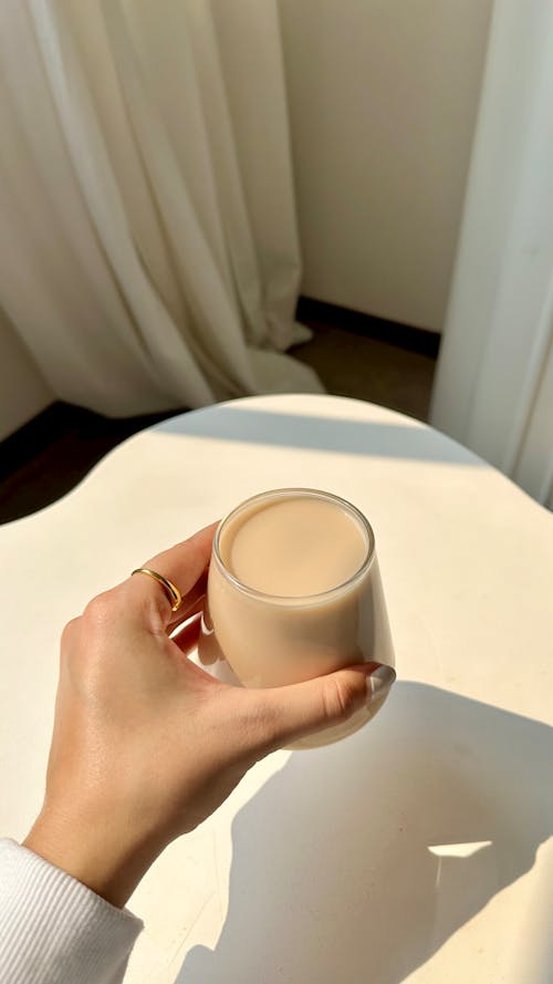 Woman Hand Holding Coffee Glass