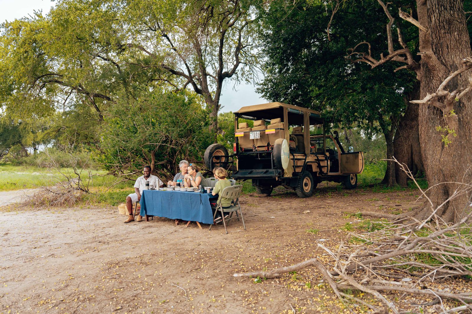 People dining outdoors in a tropical rural place