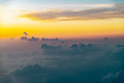 Free Stunning view of a dramatic cloudscape during sunset, capturing vivid colors and tranquil atmosphere. Stock Photo