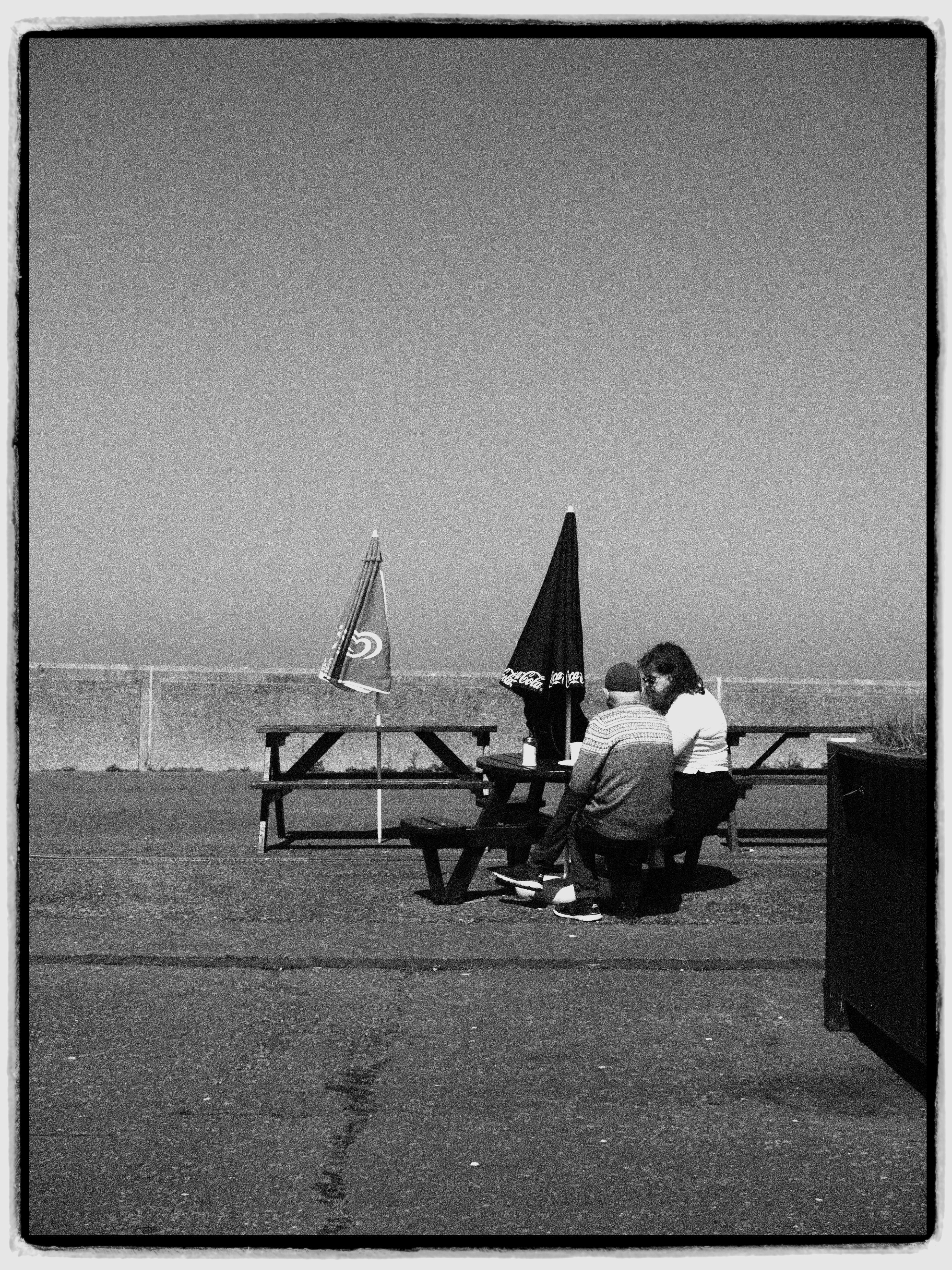 Black and White Analog Picture of People Sitting on a Bench · Free ...