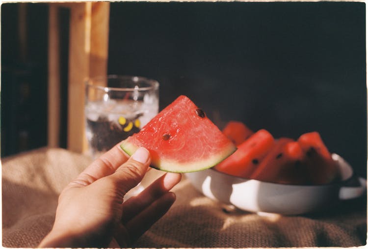 Woman Holding A Slice Of Watermelon 