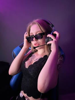 Stylish woman wearing sunglasses and a headset, embodying gaming culture.