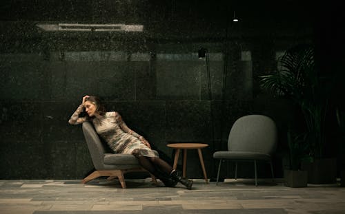 A Woman Posing on a Chair