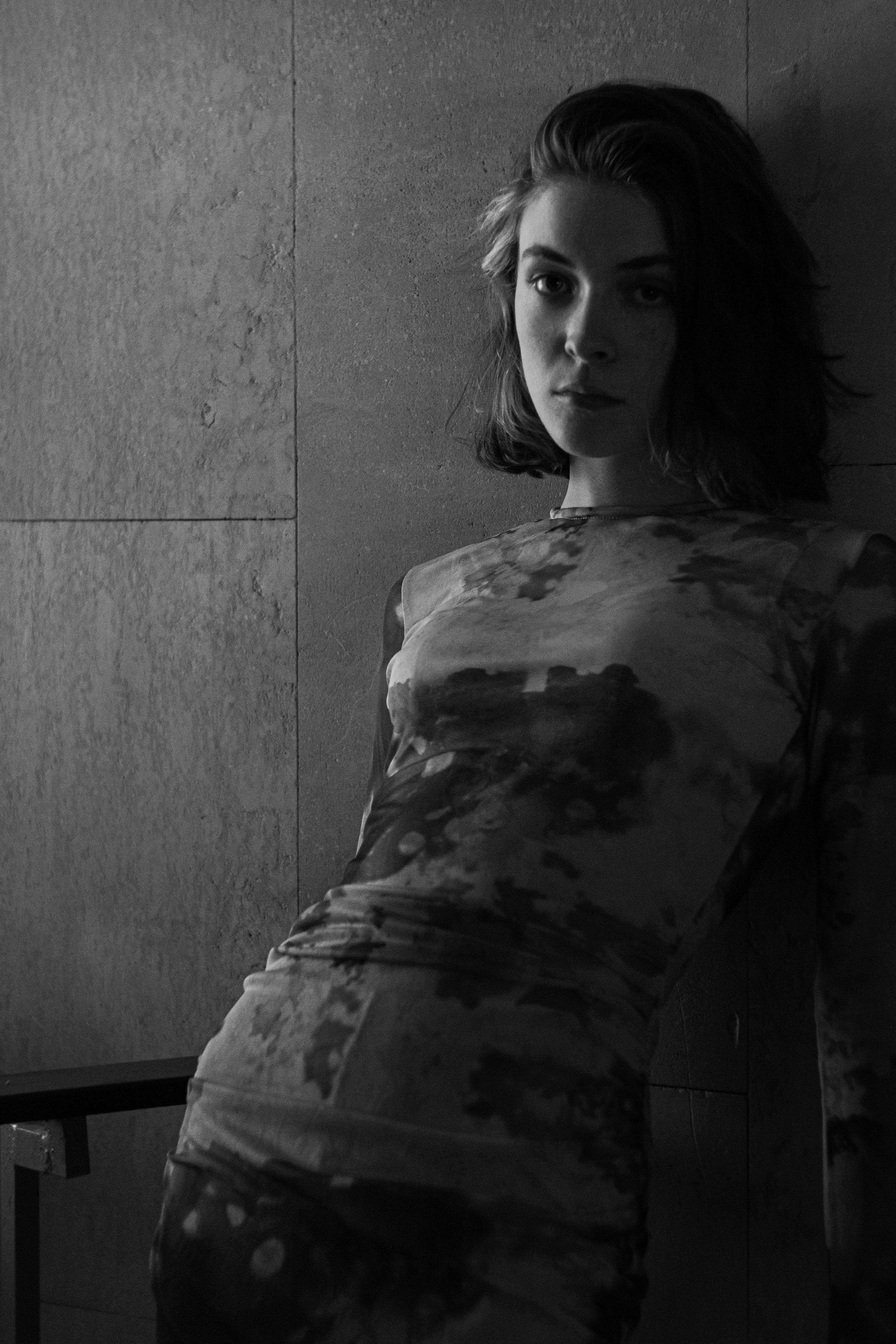 A Portrait of a Woman Wearing Dress in Black and White · Free Stock Photo