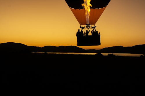 Silhouette of Flying Hot Air Balloon