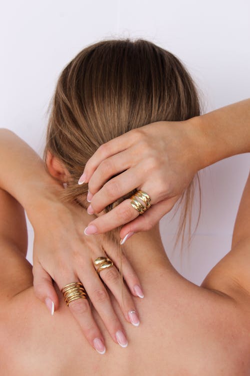 Gratis Fotos de stock gratuitas de anillos, cabello, de espaldas Foto de stock