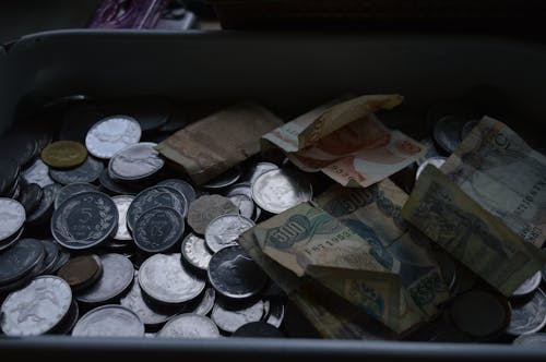 Coins and Banknotes on Tray