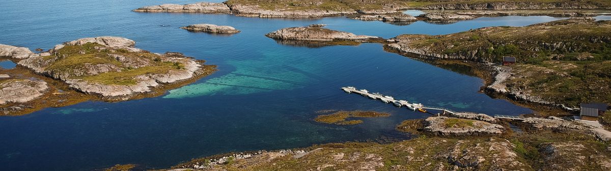 Aerial view of a rocky Norwegian coastline and tidal strait — photo by Cynrar on Pexels